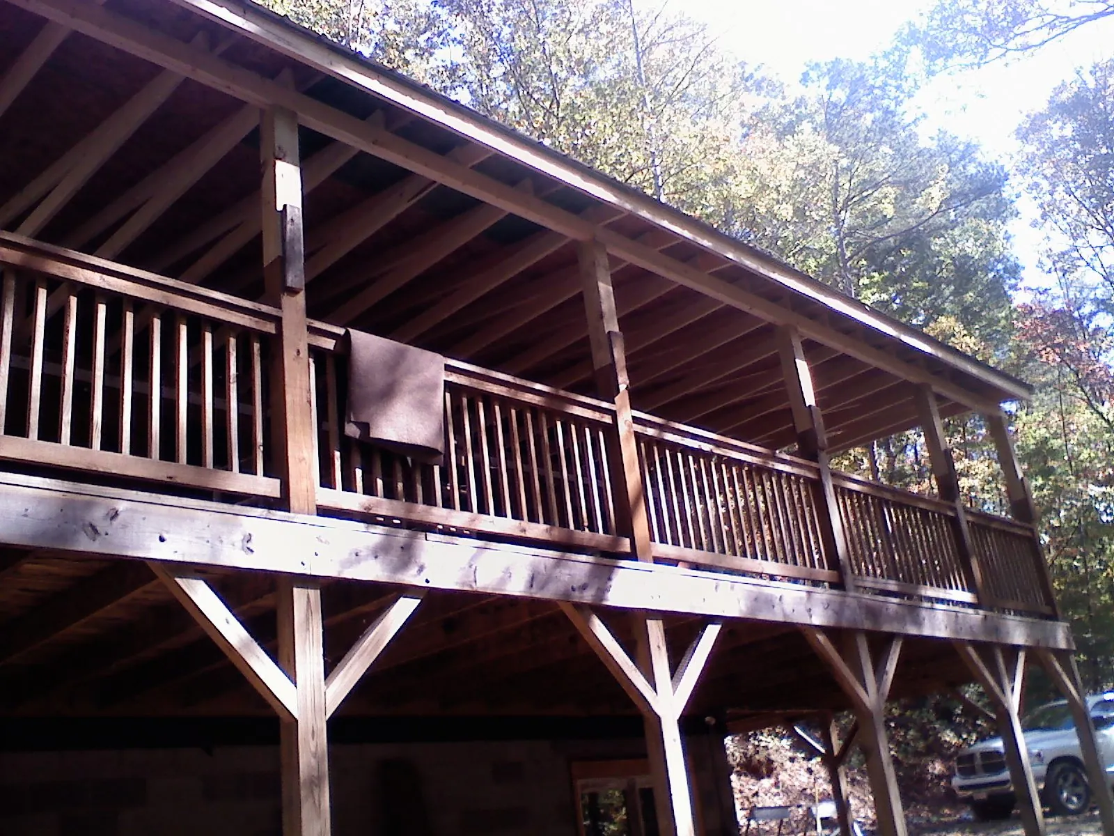 Timber framing under a new elevated porch and deck — Roof Leak Repair in College Park by Roofing Brothers
